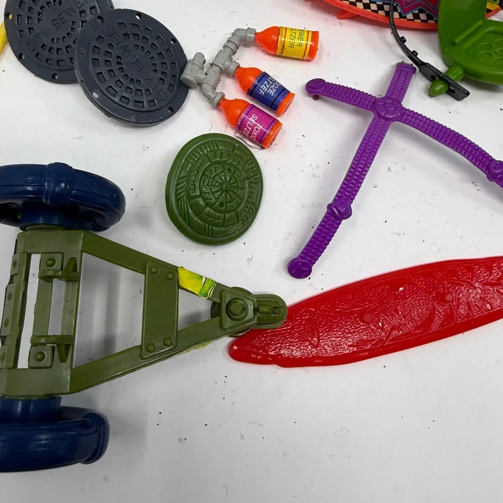 Vintage TMNT Accessories Lot Playmates Sewer Seltzer Skateboard Manhole Covers